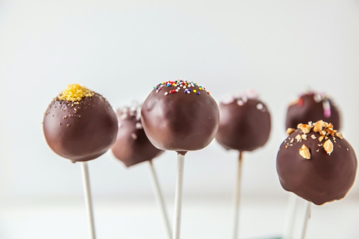 Chocolate-dipped cake pops on sticks